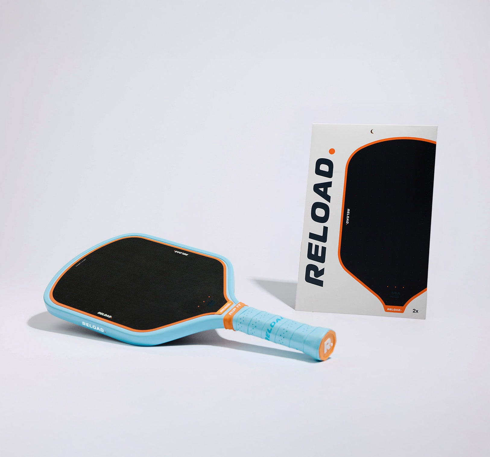 Reload - the pickleball paddle system with a replaceable surface